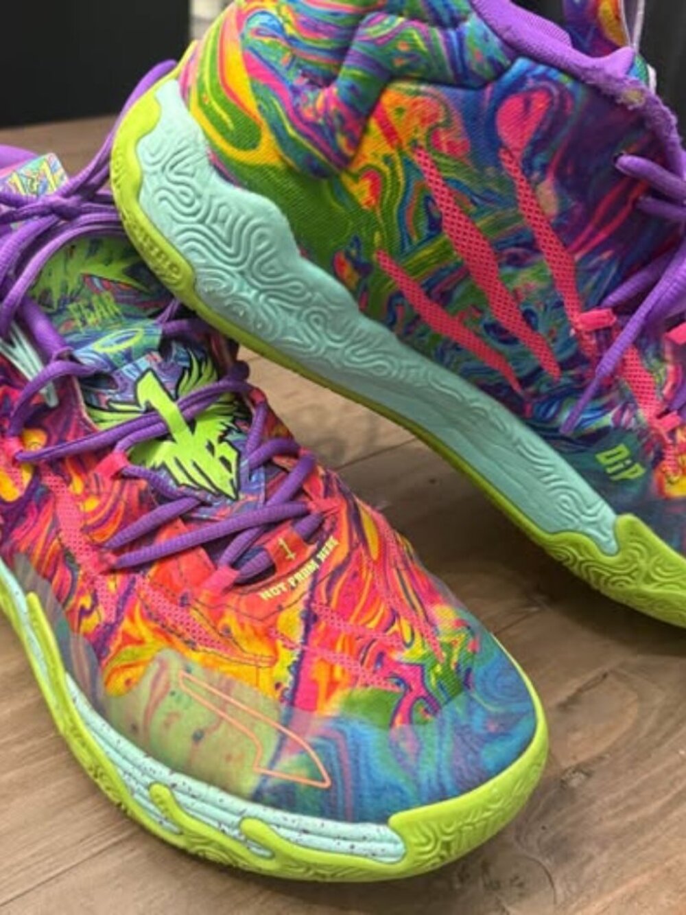 PUMA x LaMelo Ball MB.03 “Be You” basketball shoes in the colourful purple/green
